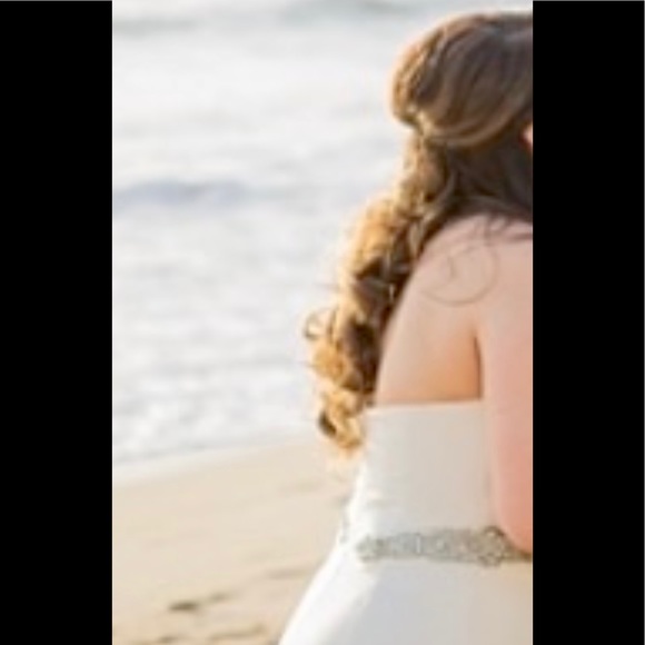 Nicole Miller Wedding Dress with sewn in crystal belt. Style is Dakota. - Picture 3 of 8